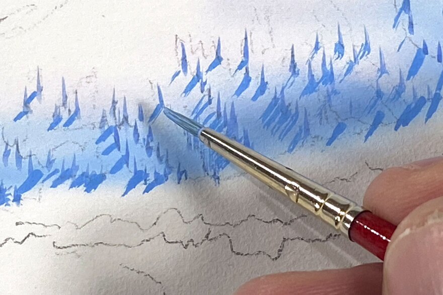 Каждое заснеженное дерево и тень на карте были нарисованы вручную.